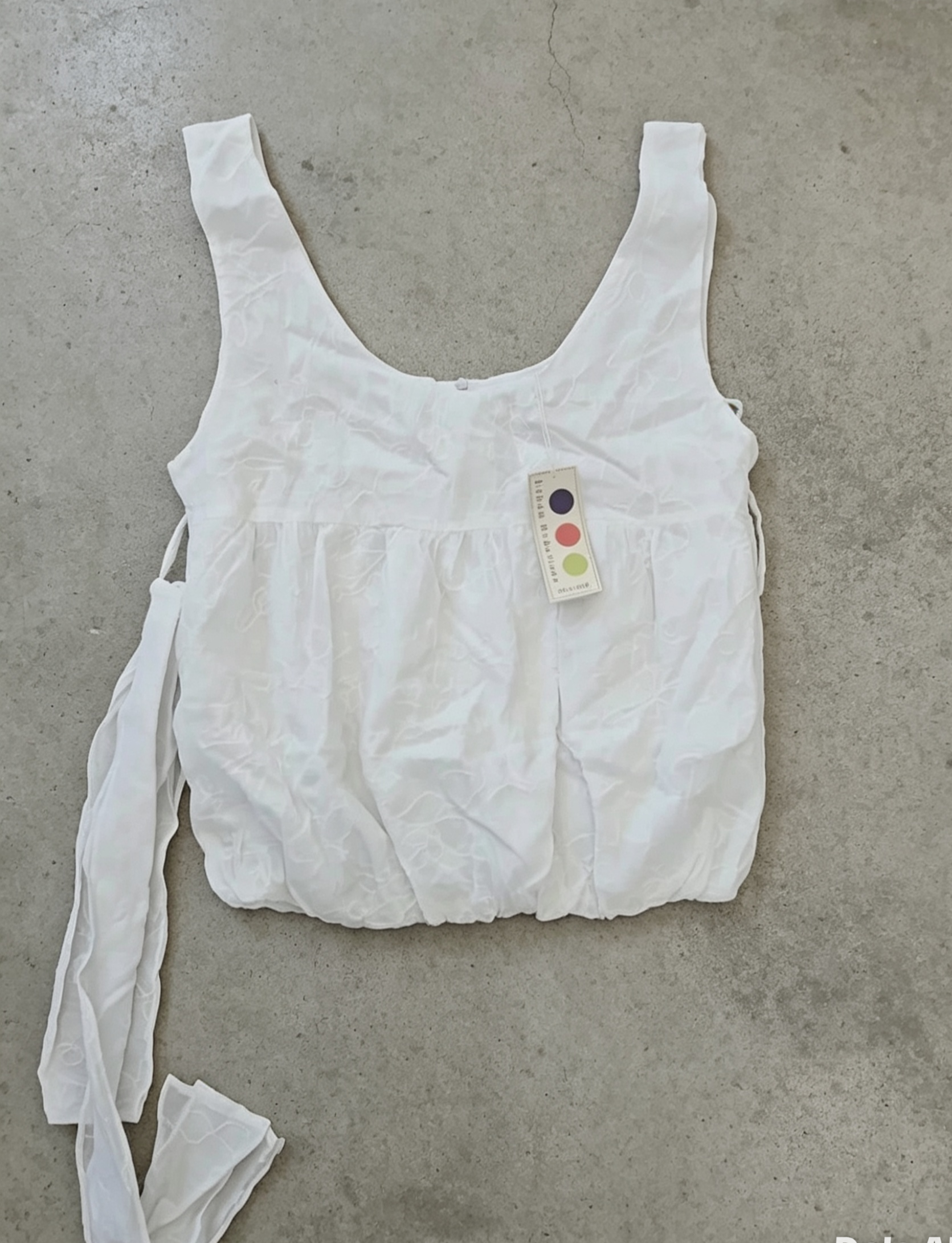 White vest top