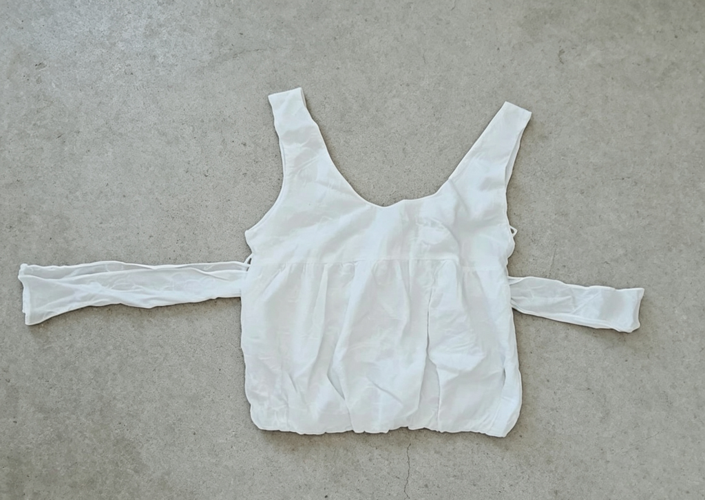 White vest top