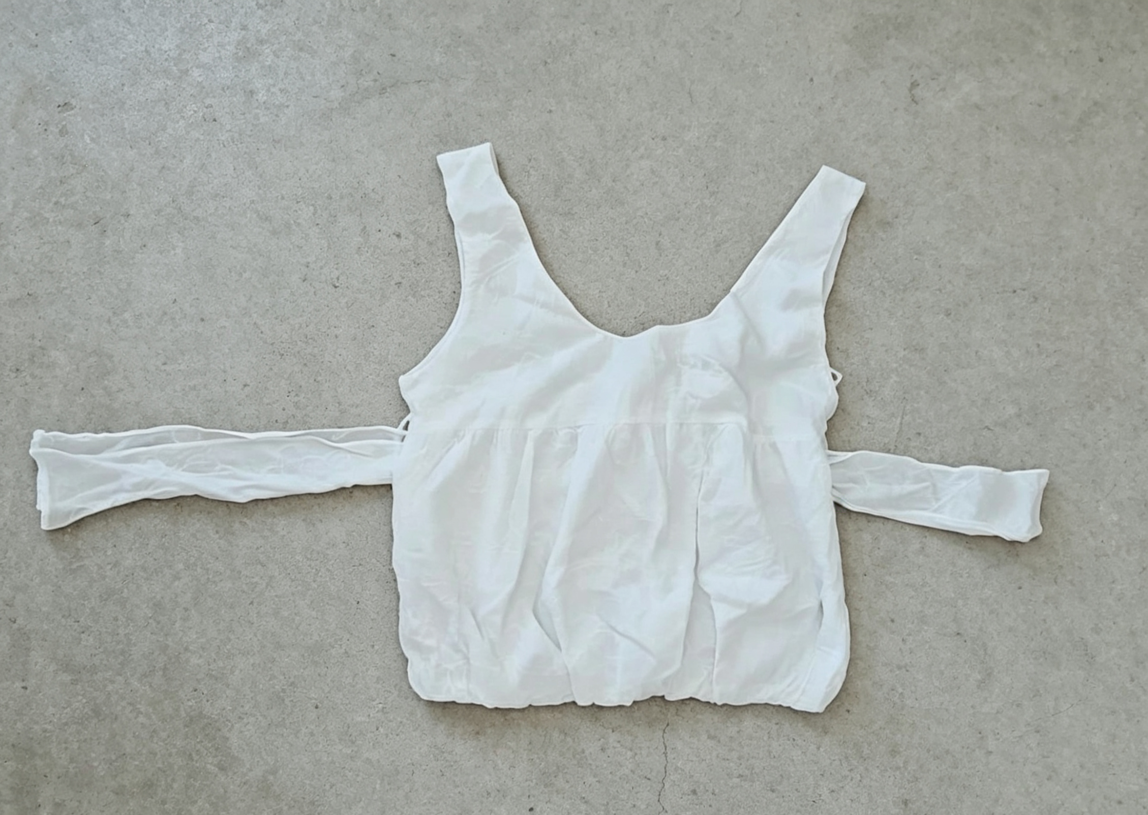 White vest top